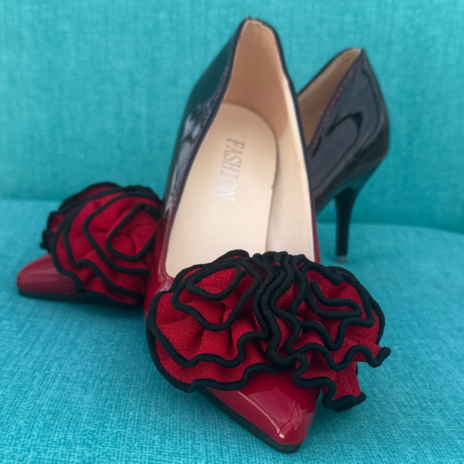 Red Patent Pointed-Toe Pumps With Decorative Rosette